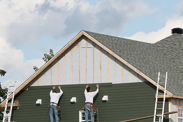 Professional Siding Installation technician working in Niles, IL